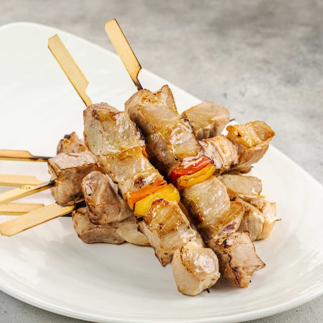 Маринованная свиная шея семенем кориандра