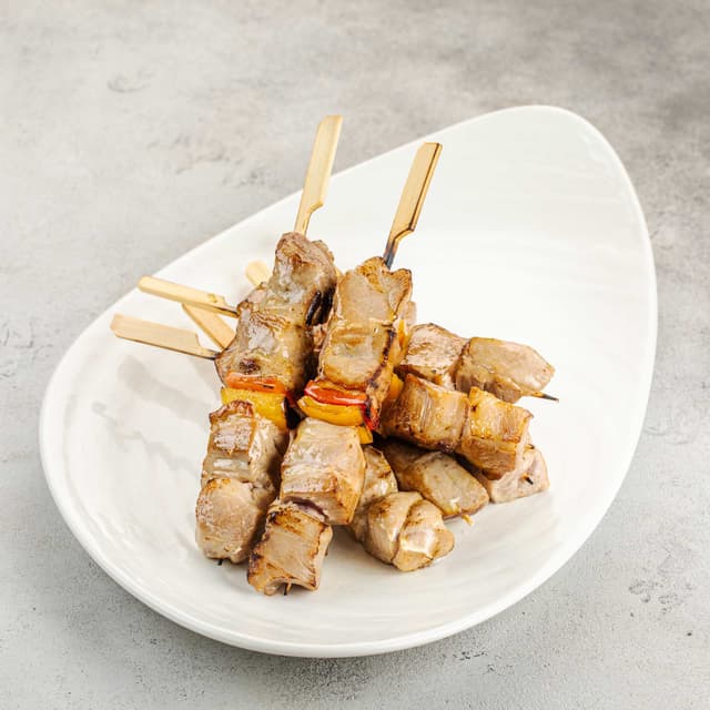 Маринованная свиная шея семенем кориандра