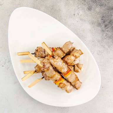 Маринованная свиная шея семенем кориандра